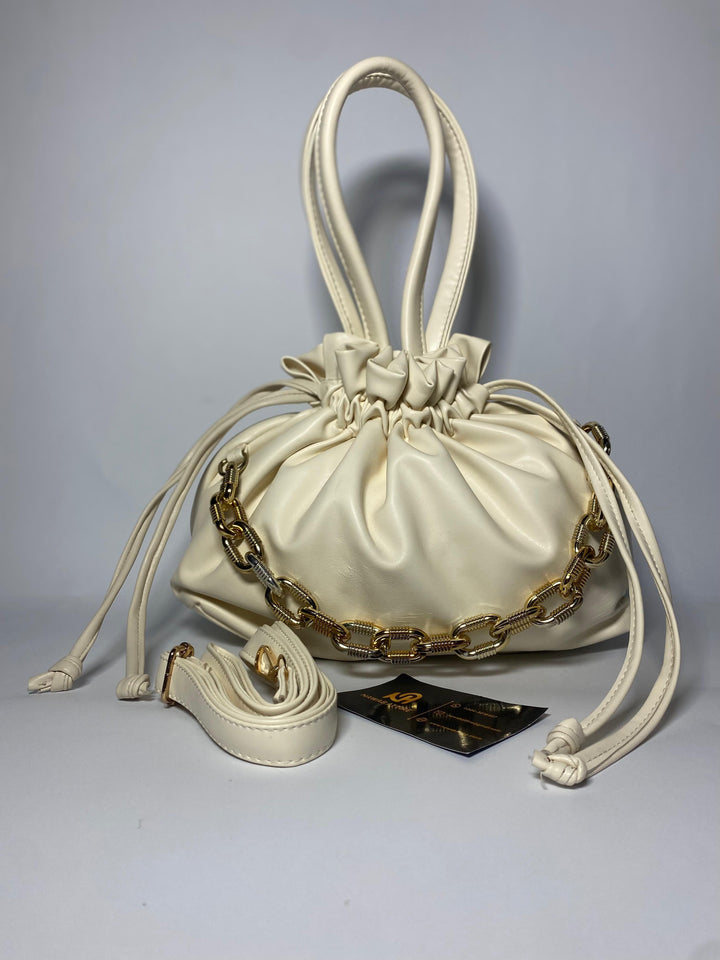 "Moonlit Mosaic: A Potli of Tradition Reimagined with Modern Grace and Timeless Artisan Detailing"