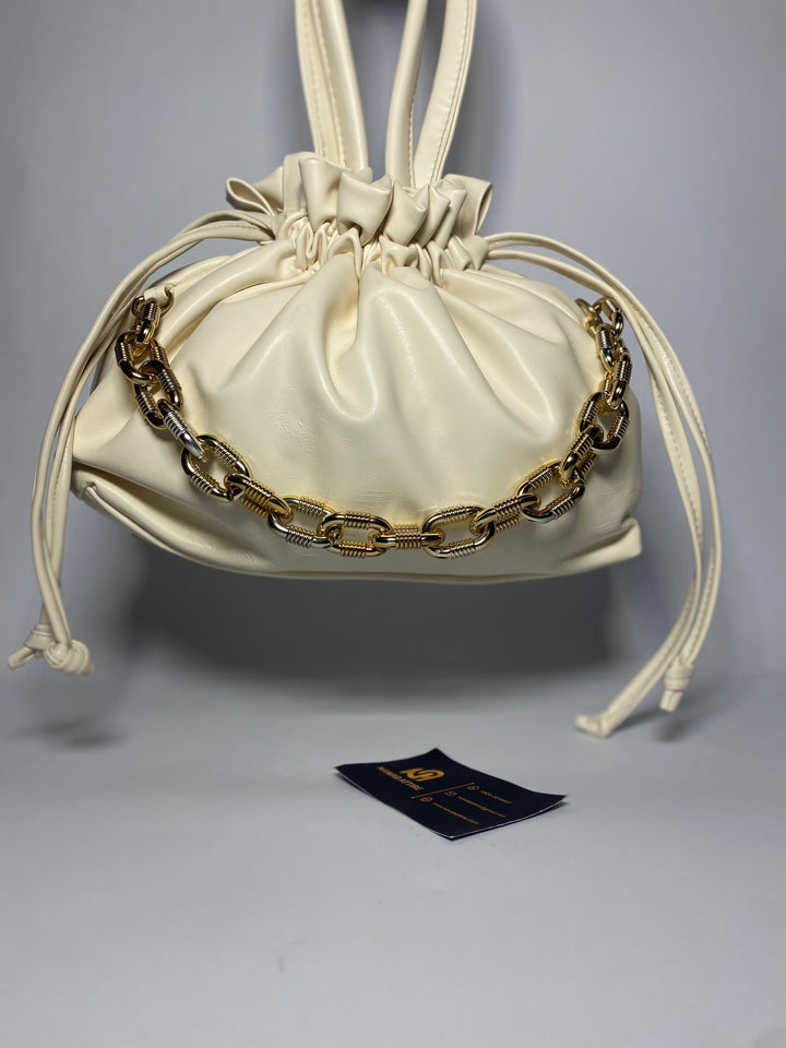 "Moonlit Mosaic: A Potli of Tradition Reimagined with Modern Grace and Timeless Artisan Detailing"