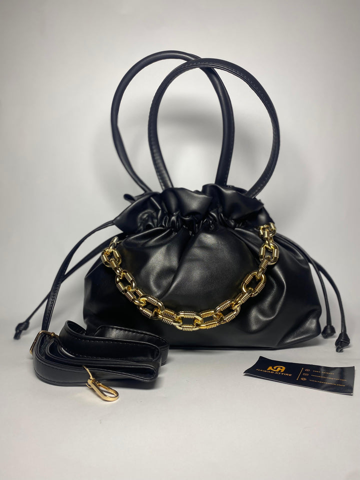 "Moonlit Mosaic: A Potli of Tradition Reimagined with Modern Grace and Timeless Artisan Detailing"