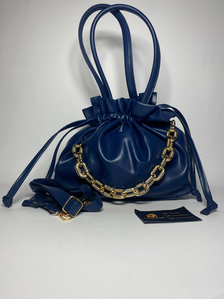 "Moonlit Mosaic: A Potli of Tradition Reimagined with Modern Grace and Timeless Artisan Detailing"